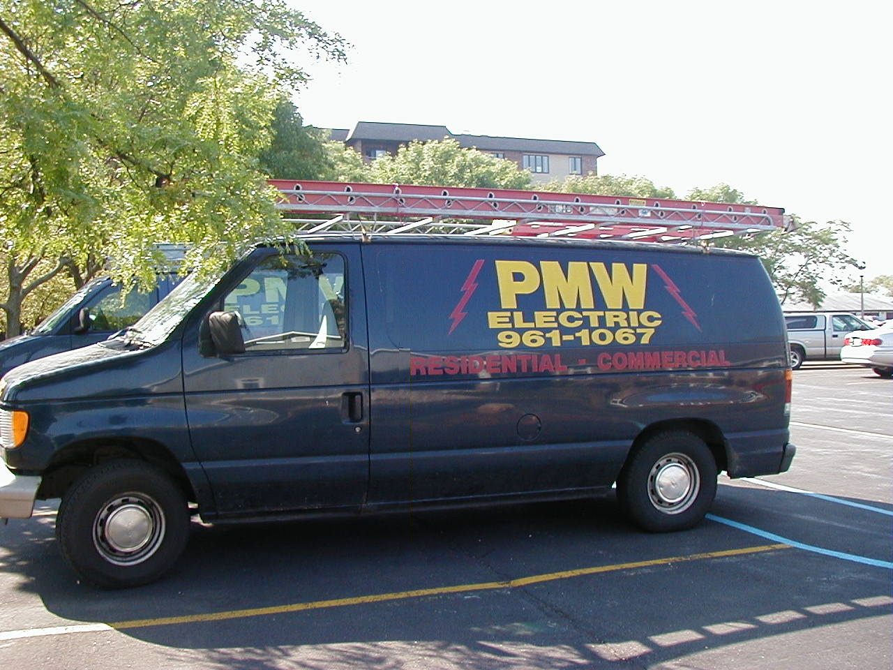 PMW Electric Employee's all use Dark Blue vans with Distinctive lettering